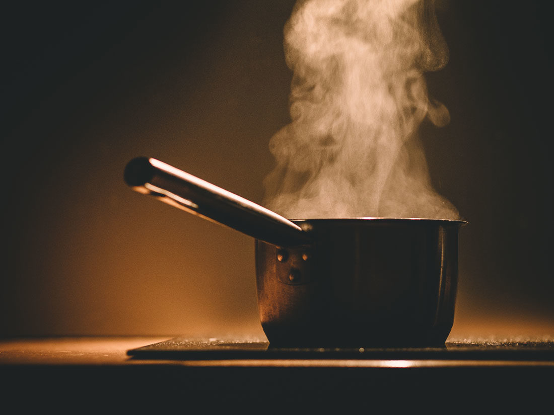 Pot of boiling water in the kitchen